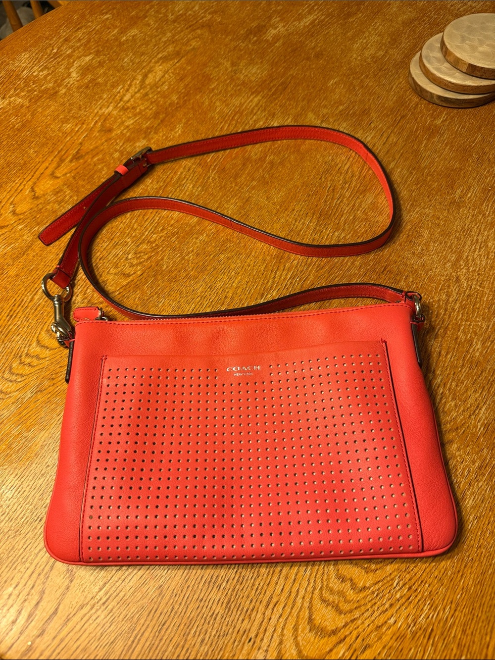 Coach Pink Perforated Leather Crossbody Bag